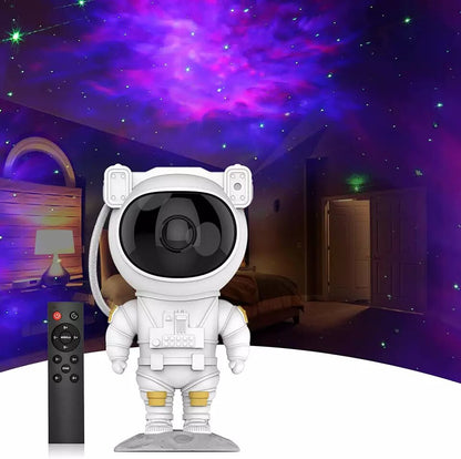 A white color astronaut galaxy projector standing next to it's remote in a room with galaxy lights